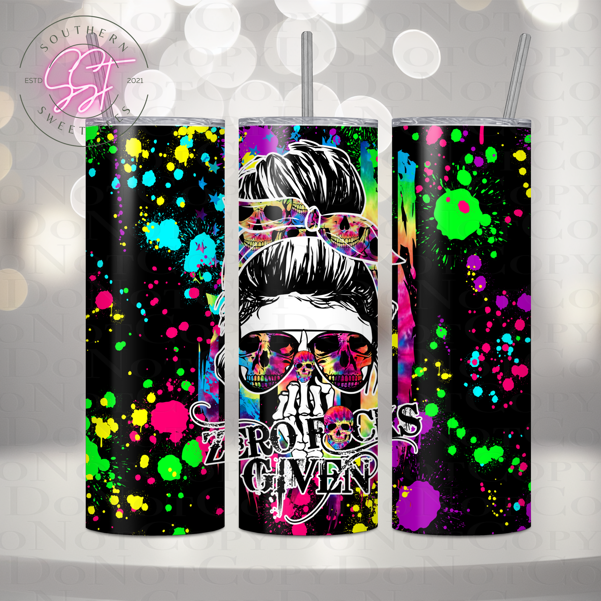 20oz sublimation tumbler decorated in neon splatters saying zero fucks given with the image of a female skeleton holding up the middle finger 