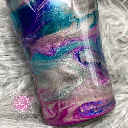 Pink Teal Silver and holographic alcohol inks swirled on a 20oz curved tumbler