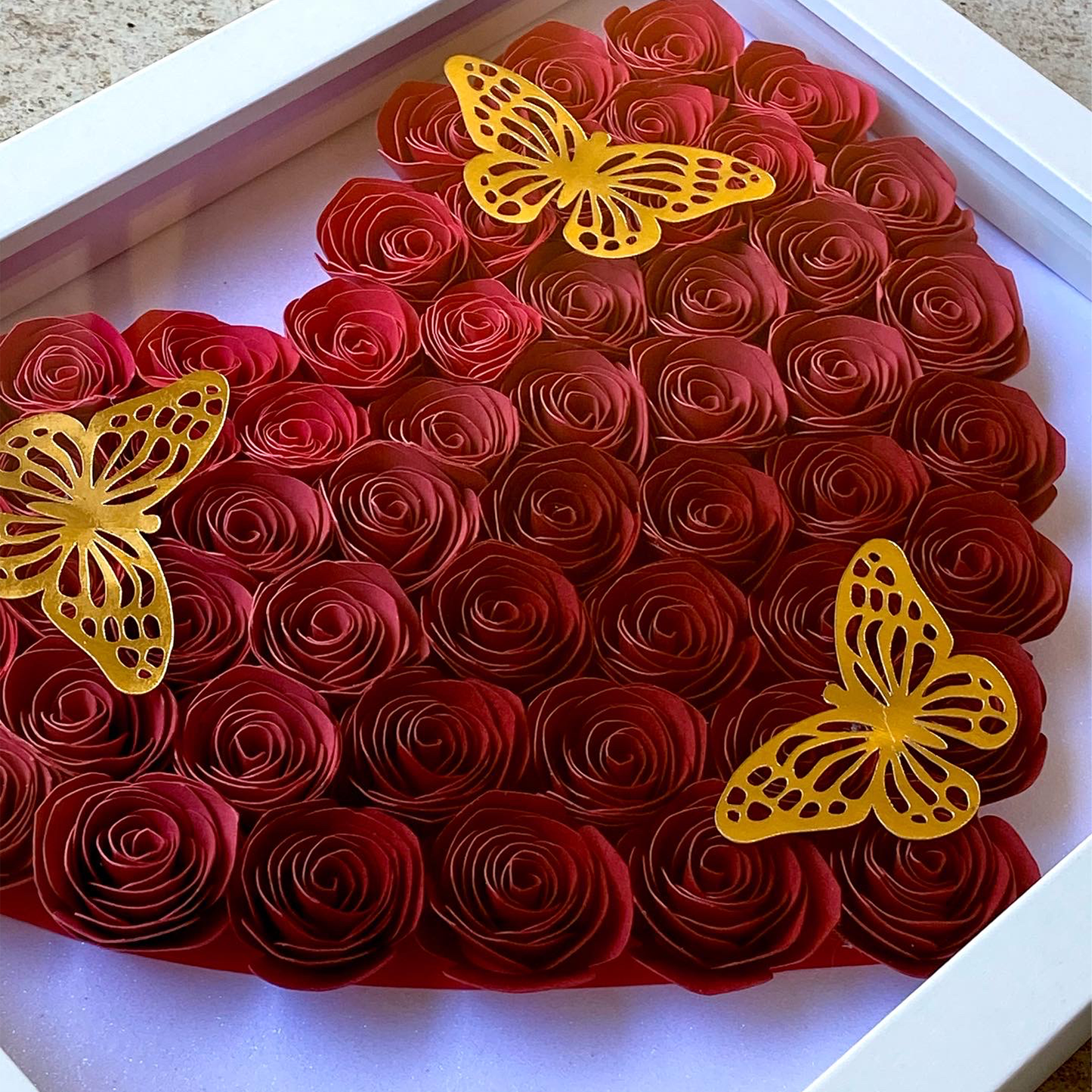 9x9 red ombre personalized hand rolled paper flowers in the shape of a heart shadowbox. Perfect gift for special someones